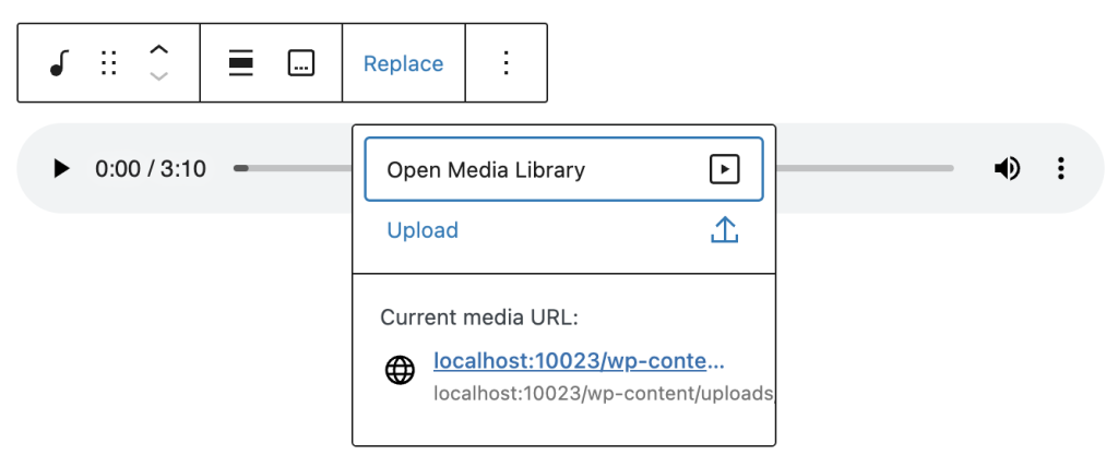 When you select the Replace option in the block toolbar you can choose between opening the media library or uploading a file.
There is also information about the URL to the current media file.